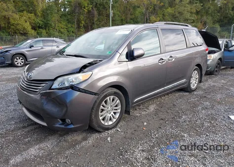 2011 Toyota Sienna Xle V6 z USA, uszkodzony, nr VIN 5TDYK3DC4BS144573